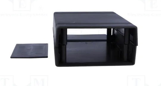 A black plastic display stand or shelf insert with a separate matching lid placed to the left, shown on a plain white background.